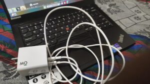 Customer reviews of GaN charger praising compact design, fast charging, reliability, and value for money.